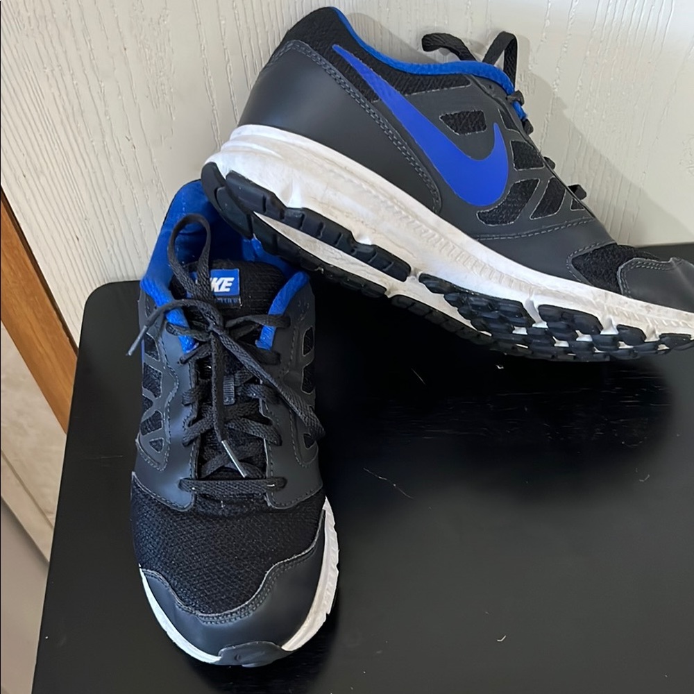 Nike Black and Blue Sneakers with Modern Sporty Design